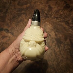 AVON BULL DOG PIPE AFTER SHAVE DECATER FULL OF OLAND AFTER SHAVE.